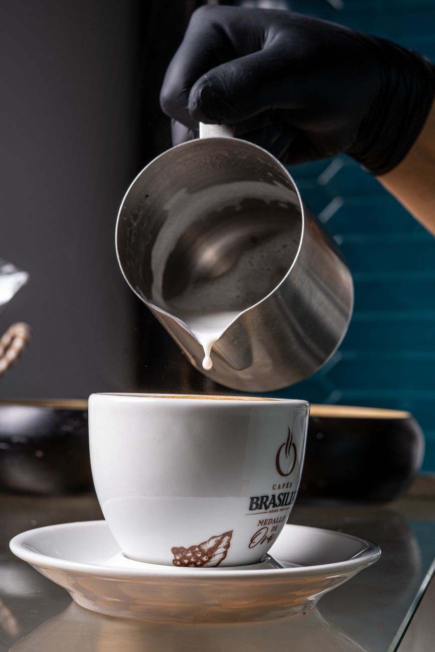 Barista pouring latte art
